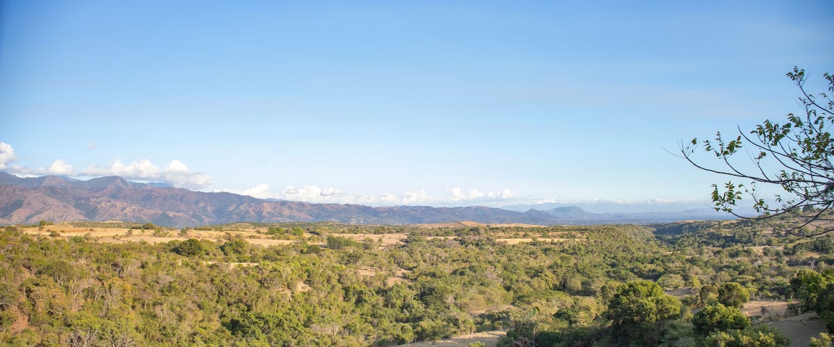 CRATER OF AN EXTINCT VOLCANO ON THE SOUTH SIDE OF THE CENTRAL MOUNTAIN RANGE OF THE DOMINICAN REPUBLIC, IN THE SAN JUAN VALLEY