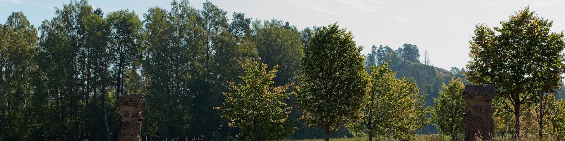 Rural gravel road to Hakoinen Castlehill in summer, Hakoinen, Janakkala, Finland.