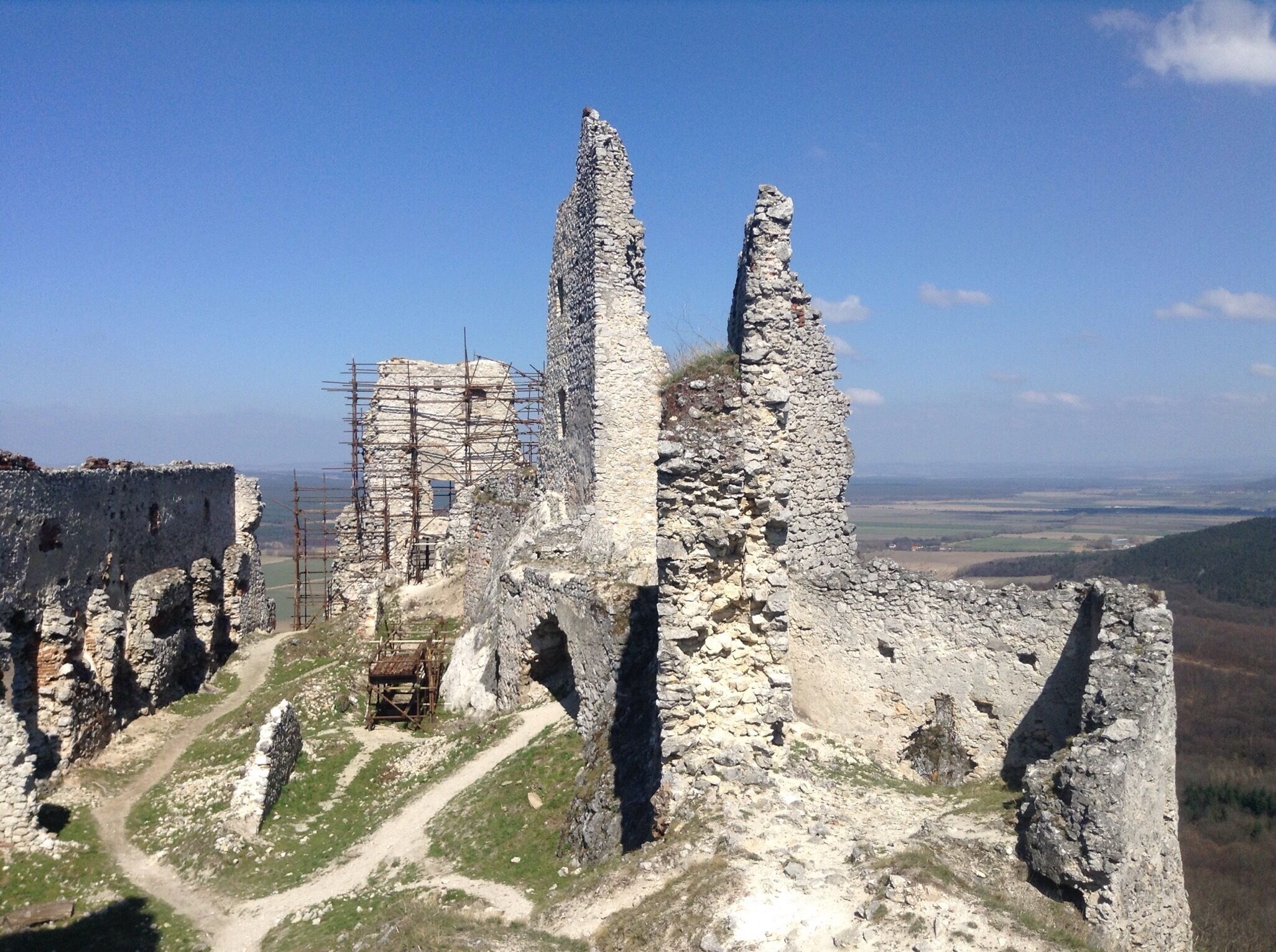 A historic stone ruin with a clear view of the surrounding landscape.