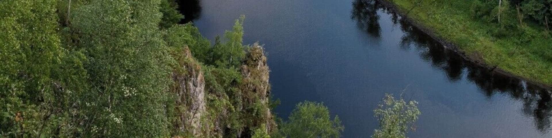 This photo was shot from location called Koňova skala (Horses rock). Theres an awesome view on water reservoir Ruzin and also Sivec which you can see at the photo.
I recommend you to visit this place at morning as the light hits the limestone of Sivec :)
#BvSApplication