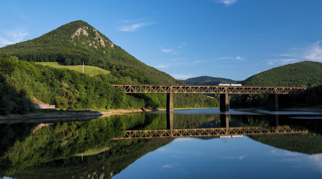 Blue reflections
Very photogenic location especially in autumn. This was shot at summer, the reflection on calm water cough my attention, waited for a train and bam! Do you like it? :)
You can go there by car, its right next to water dam.
#bvsblue