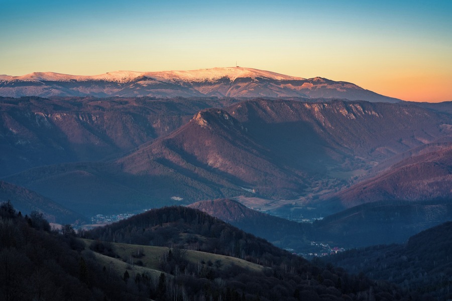Kraľova hoľa, an iconic mountain in Low Tatras. We can see it on the horizon of this photo,. Just before it, in the middle are ruins of Muran Castle. Photo was taken from the unnamed hill in Muranska Planina National Park in Slovakia.
more on:
https://www.instagram.com/ladislavszabo_landscapes/