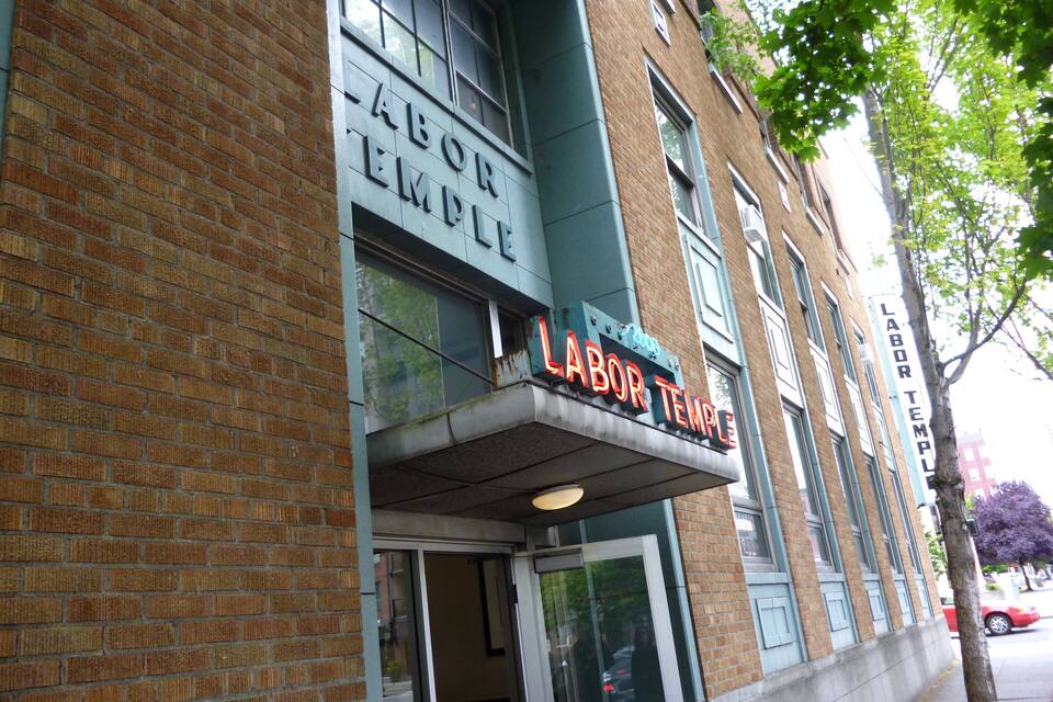 A brick building with a sign that reads "Labor Temple".