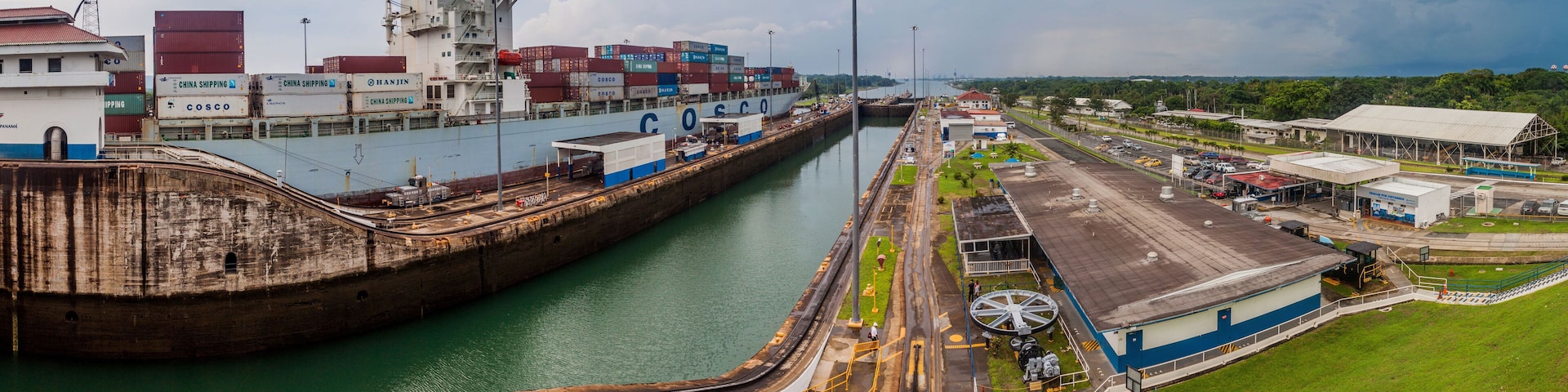 GATUN, PANAMA - MAY 29, 2016: Container ship Cosco Boston is passing through Gatun Locks, part of Panama Canal.
