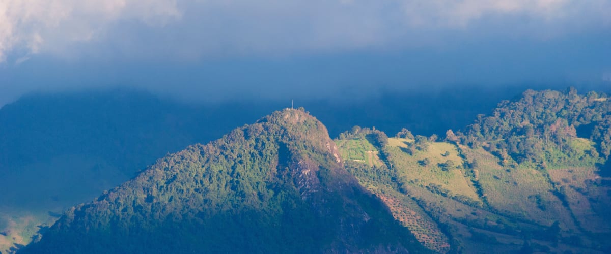 Mountains crops and deforestation Guatemala, urban and rural view.