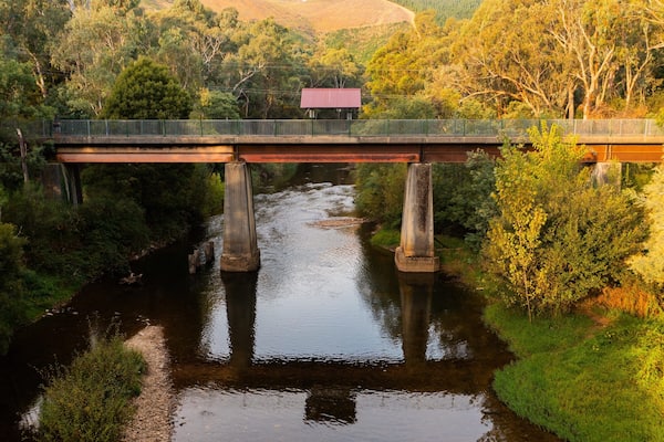 Ovens River Rail Trail Bridge showing a bridge and a river or creek