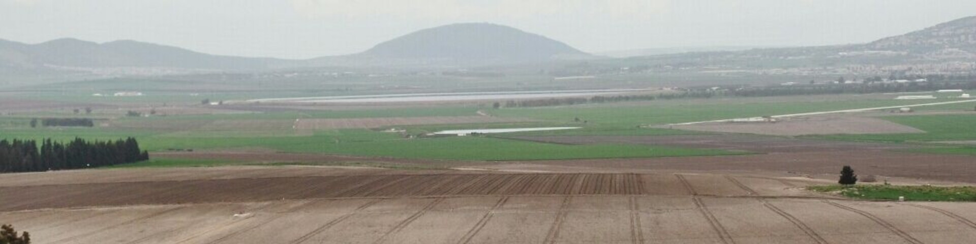 View from top of Megiddo ruins of the Valley of Armageddon with Mt. Tabor I the distance.