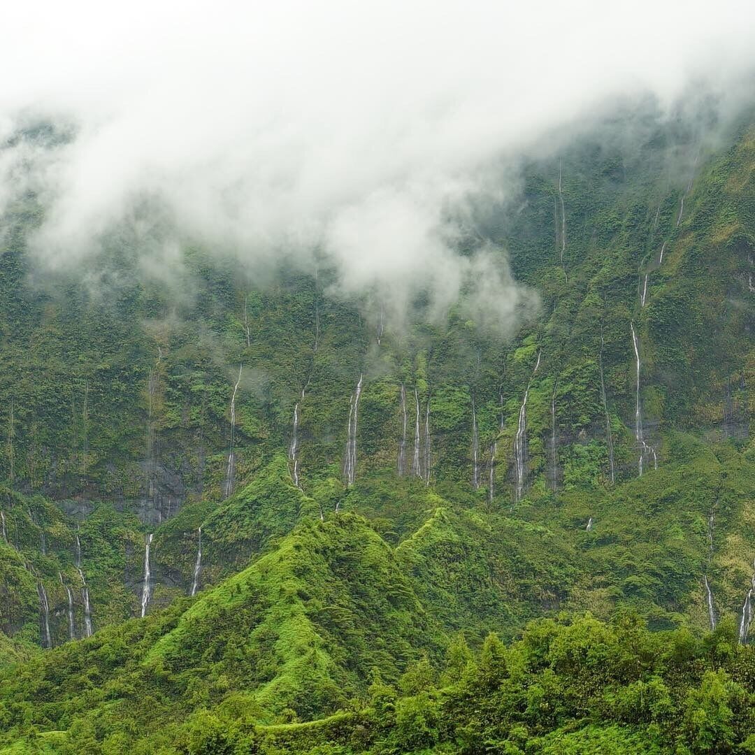Multiple waterfalls symbolize the hair of Godess “Pere”.  The valley  located on Tahiti was her home before she moved to Hawai’i where she is known as “Pele”.