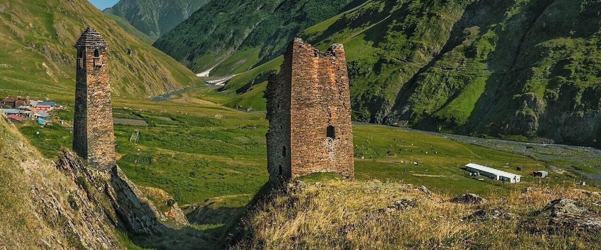 July 2010
Girevi village, Tusheti region Caucasus mountains, Georgia
Girevi (alt. 2.250 m) is the last populated village in Tusheti under the Caucasus border range with Russia. Actually you have to get a registration permit there to cross to Khevsureti region via the Atsunta pass, which is the highest point of the popular trek from Omalo to Shatili. Beware of the big Caucasian shepherd dogs there and do not miss the opportunity to play soccer with the border guard station soldiers. You can also admire the old watchtowers which are significant for this region. They stand there since Middle ages when they were built by the Tushs to protect the invaders from Georgian kingdom.