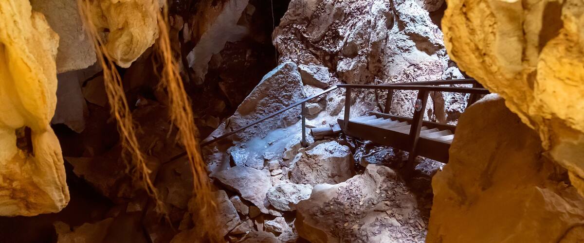 Stairs Leading Across Underground Cave Formations