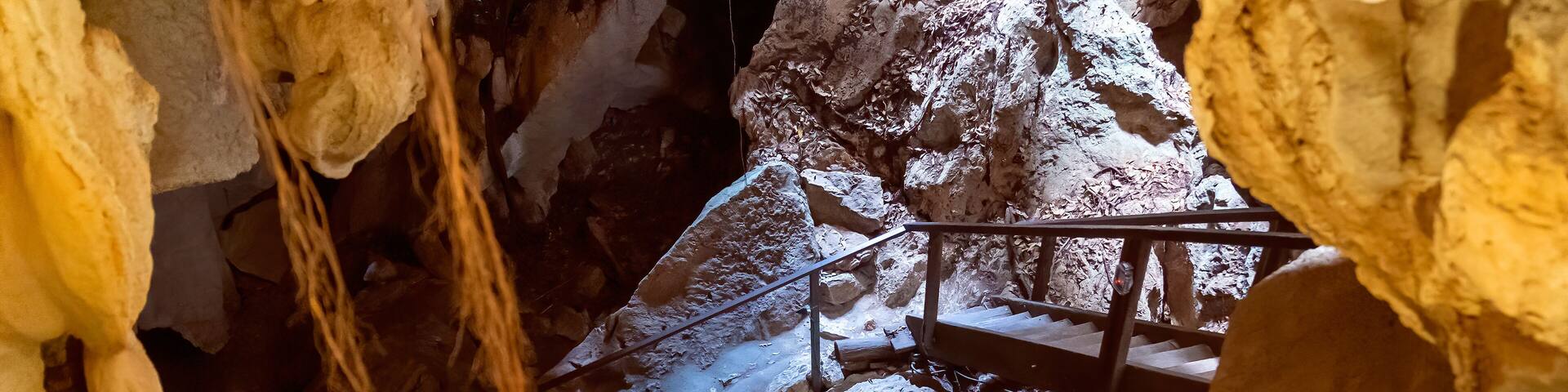 Stairs Leading Across Underground Cave Formations