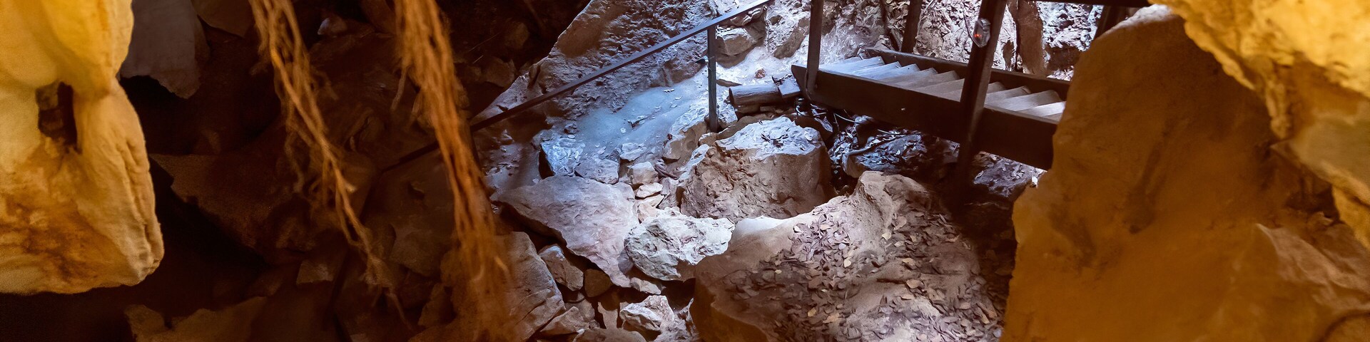 Stairs Leading Across Underground Cave Formations