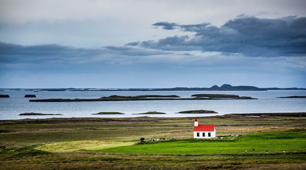 Iceland, lonely red church in the westfjords; Shutterstock ID 560378446; purchase_order: -; Order: -; client: -; job: -