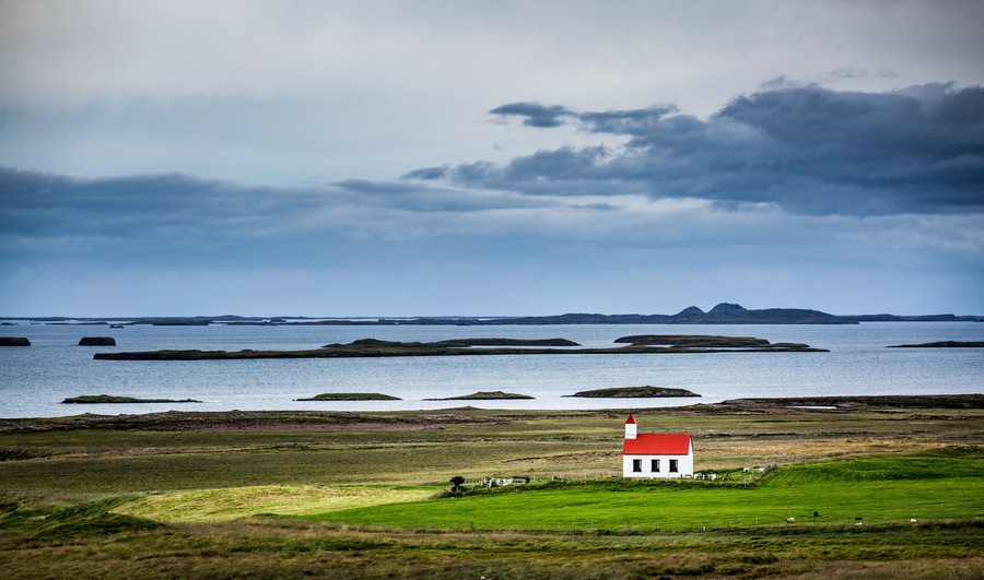 Iceland, lonely red church in the westfjords; Shutterstock ID 560378446; purchase_order: -; Order: -; client: -; job: -
