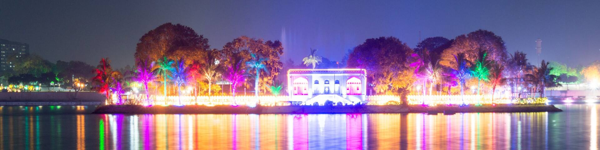 Beautiful and colorful lights reflected in the water of kankaria lake ahmedabad, gujarat