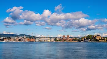 Oslo, Norway - Panoramic view of Oslo waterfront with Akershus Fortress, City Hall and Aker Brygge borough at Pipervika harbor