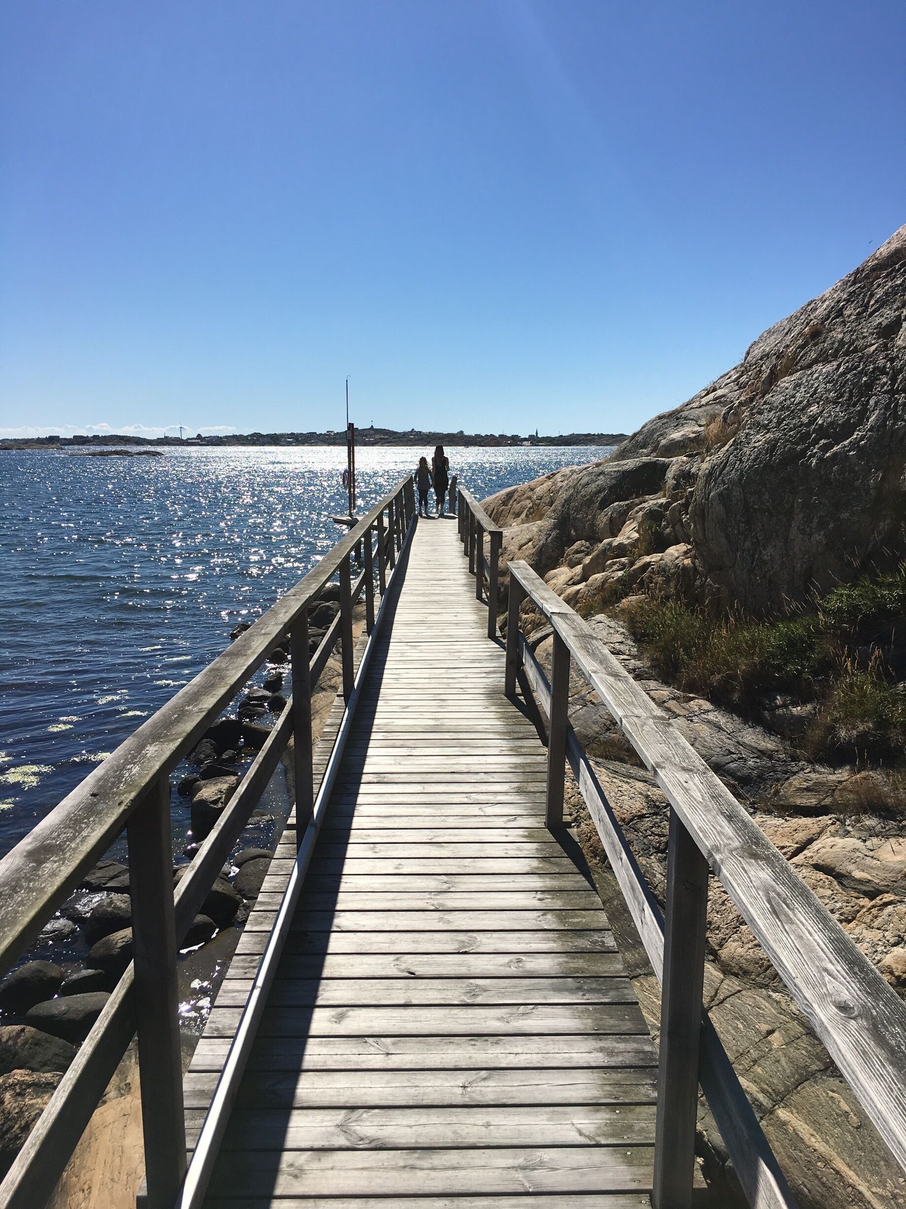 West of Goteborg, in Torslanda, just before the ferry to Okero, there is a small beach and wonderful nature walk leading away into the woods. 