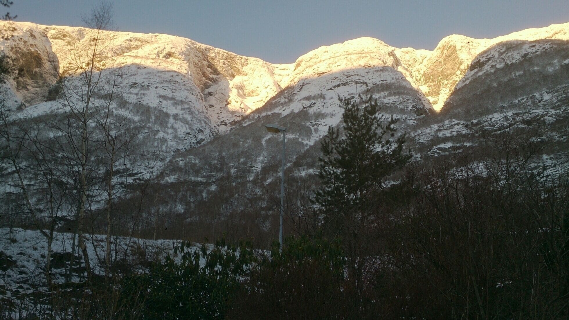 Sun on Mountains, not in valley 