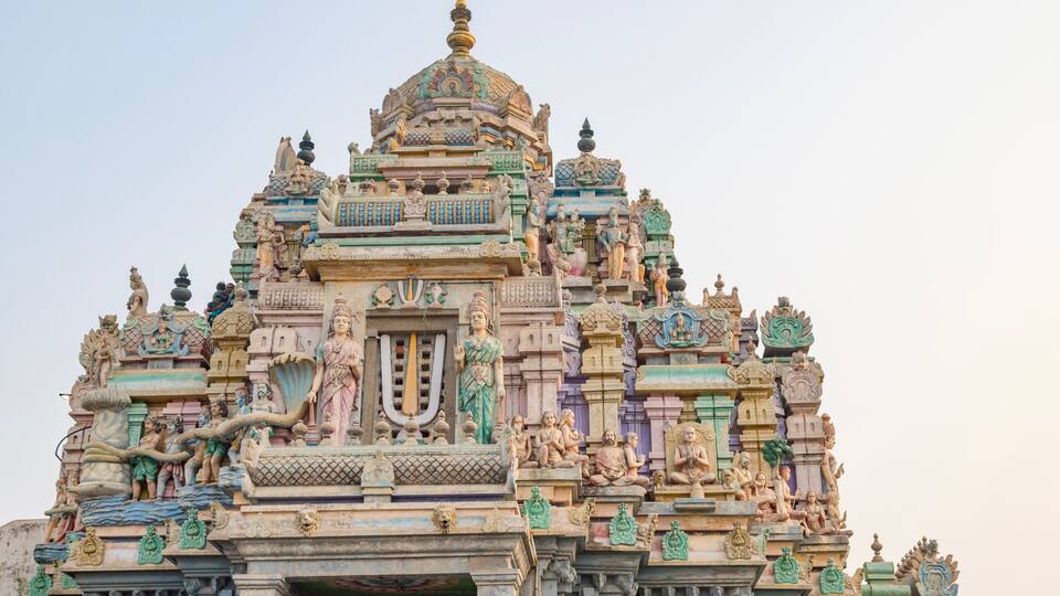 A detailed temple with intricate carvings and statues.