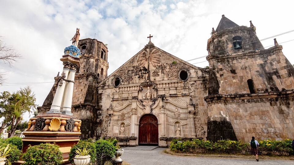 Iloilo, Philippines - April 2023: View of Miagao Church and the surrounding town proper. Also known as the Santo Tomás de Villanueva Parish Church