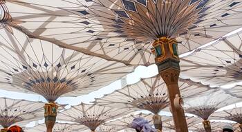 MEDINA, SAUDI ARABIA - APRIL 28 2018: These Umbrella construction on the square of Al-Masjid An-Nabawi or Prophet Muhammed