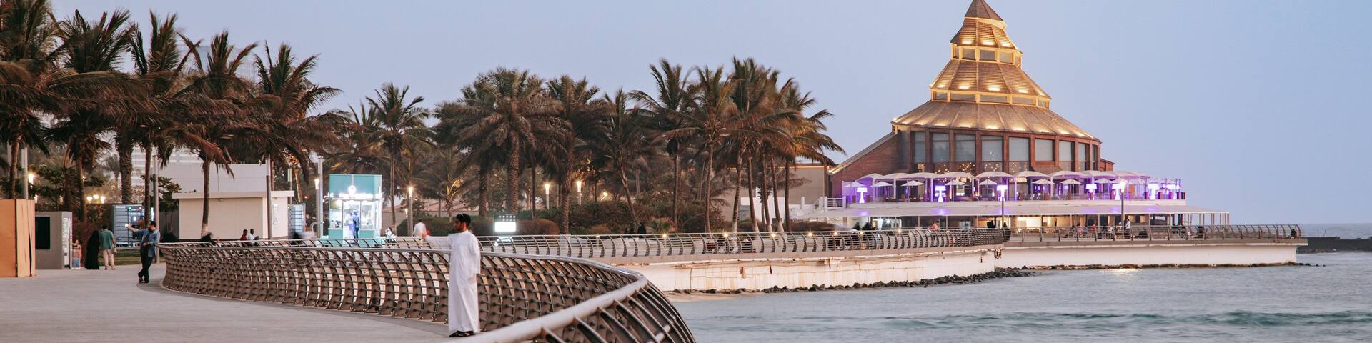 Corniche featuring a coastal town