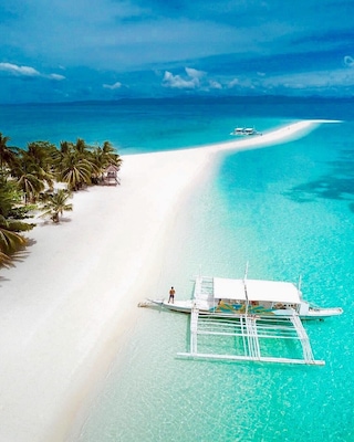 Pristine! This beach with its stunning sandbar never fails to leave us in awe.
A big shoutout to Tacloban leyte for these awesome view 
#summer#philippines#beachtips#BVSBlue