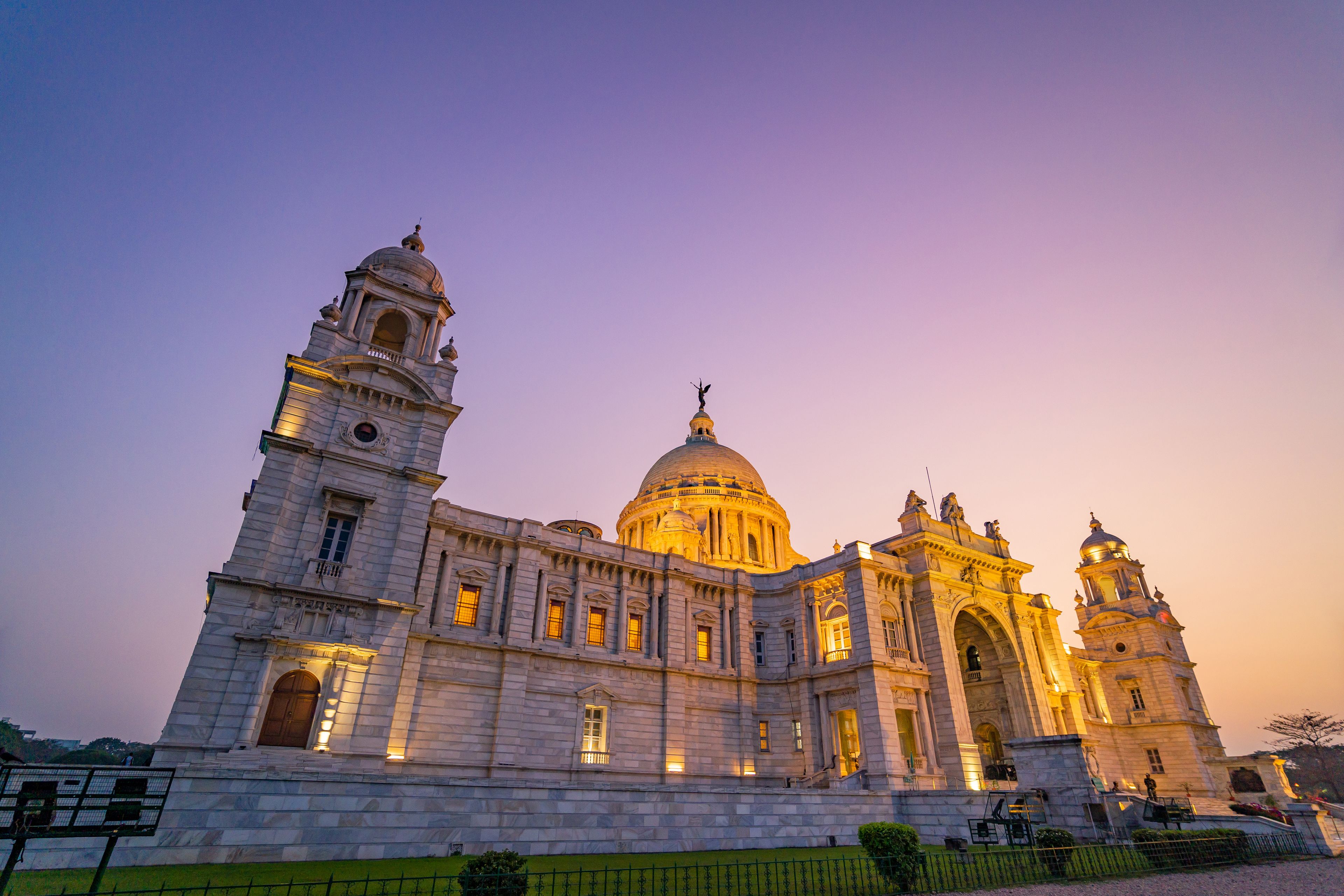 A grand historical building with a large dome, two bell towers, and classical architecture.
