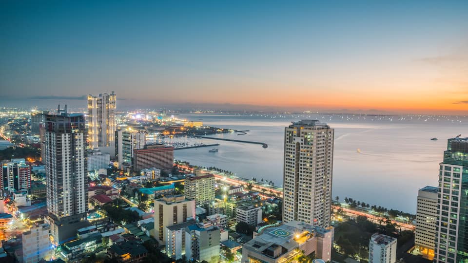 Beautiful Manila city shore Manila Bay skyline during sunset