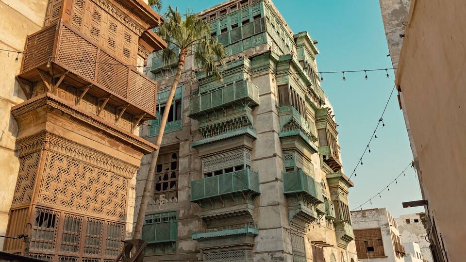 Traditional architecture of old Jeddah town El Balad district houses with wooden windows and balconies Unesco Heritage site in Jeddah Saudi Arabia