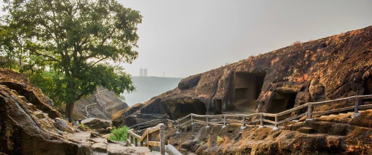 Mumbai, India: Kanheri Caves exterior which is a group of caves and rock-cut monuments cut into a massive basalt outcrop in the forests of the Sanjay Gandhi National Park