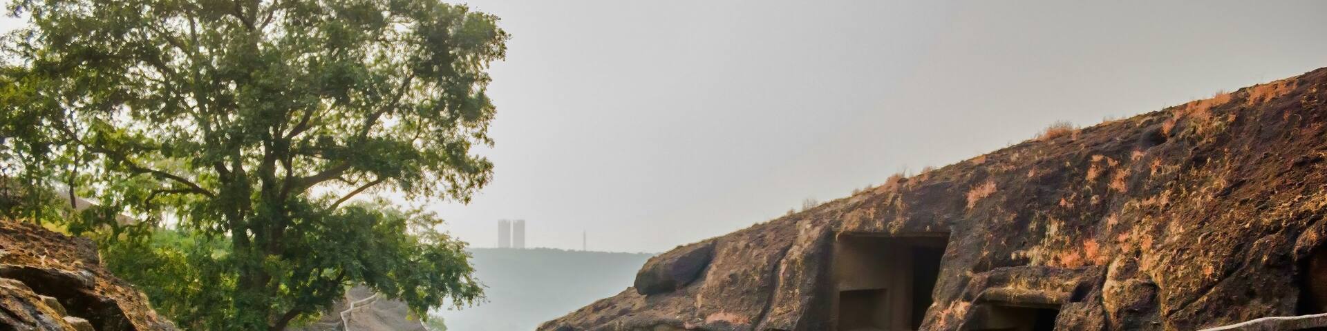 Mumbai, India: Kanheri Caves exterior which is a group of caves and rock-cut monuments cut into a massive basalt outcrop in the forests of the Sanjay Gandhi National Park