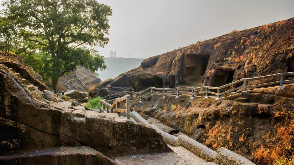 Mumbai, India: Kanheri Caves exterior which is a group of caves and rock-cut monuments cut into a massive basalt outcrop in the forests of the Sanjay Gandhi National Park