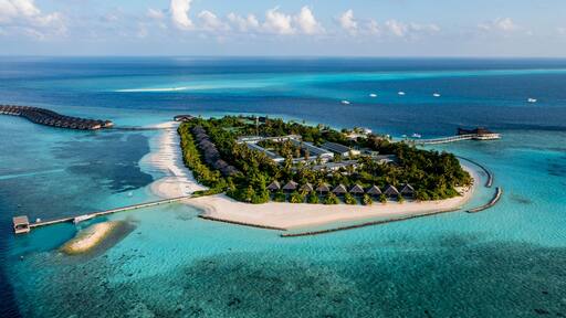 Aerial view of beaches and resort at Huruvalhi island, Maldives, Asia