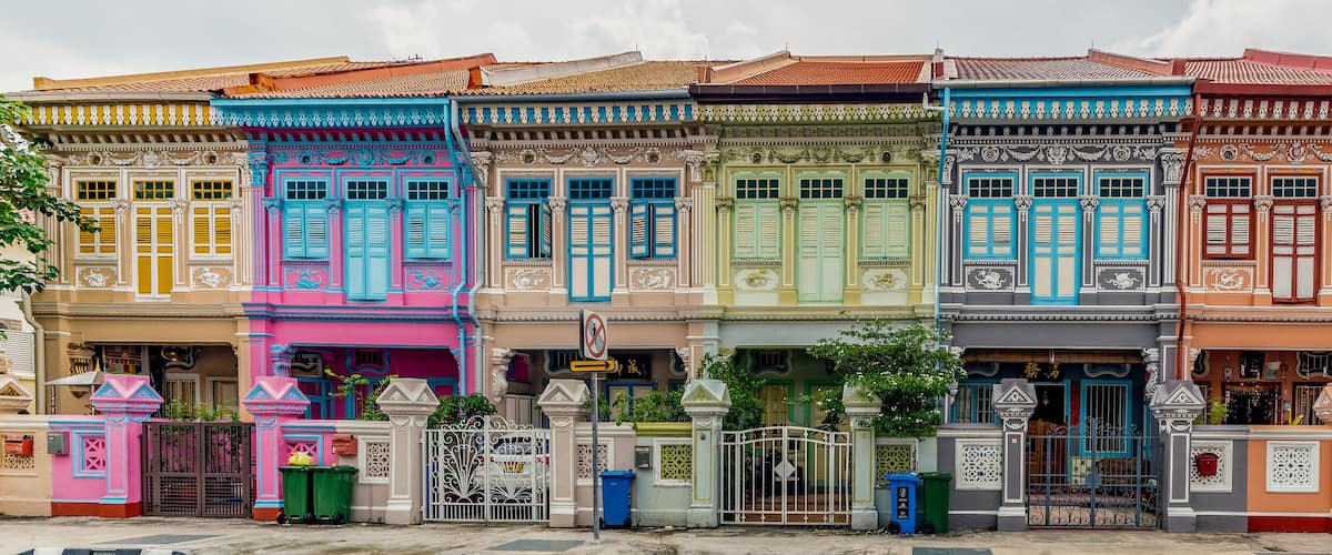 A row of colorful traditional houses with ornate architectural details.