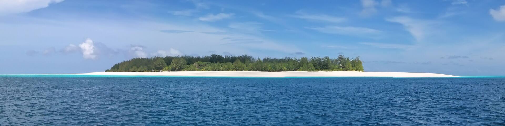 blue see and white sand of the mnemba atoll, zanzibar, tanzania,