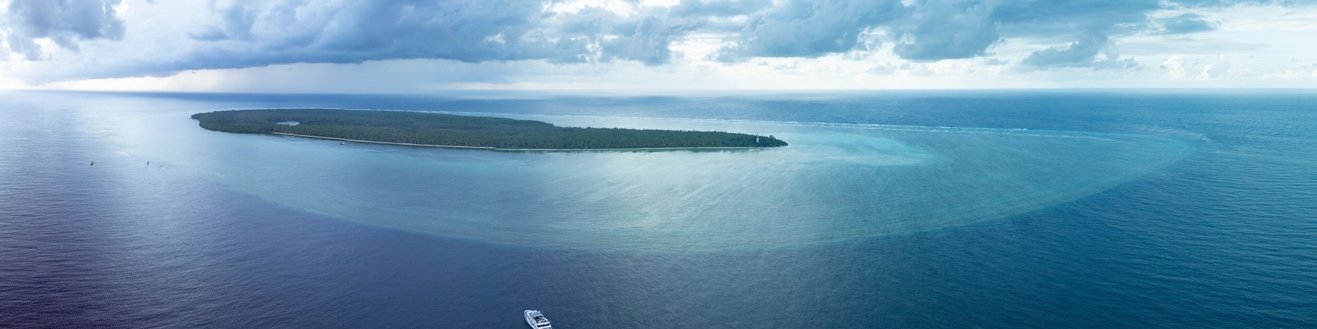 Seen from a bird's eye view, a picturesque island is found far off the southeast coast of Sulawesi, Indonesia. This area
is known for its extraordinary marine biodiversity.