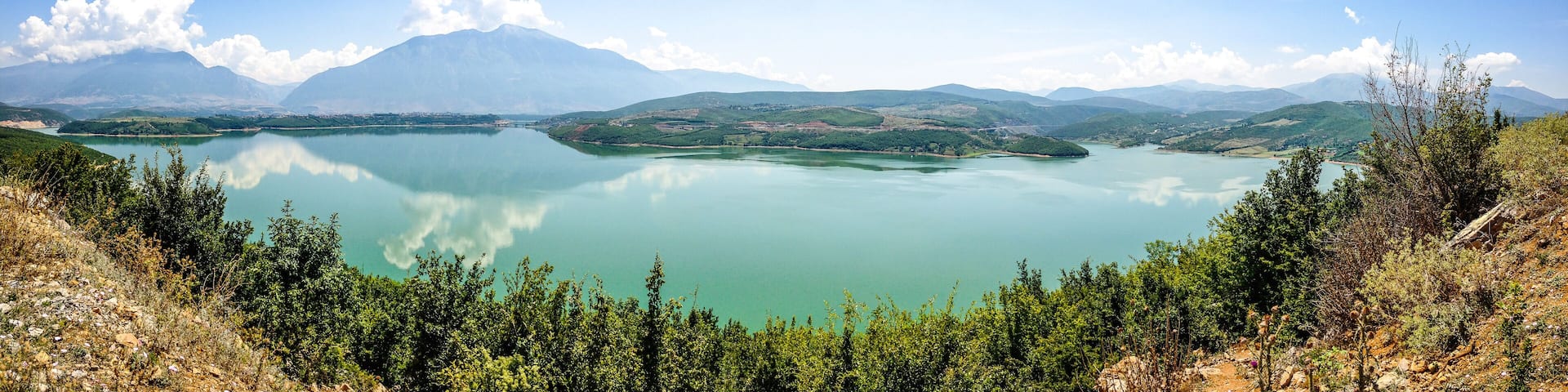 Lake Fierza near city Kukes in Albania in summer with mountains in background
