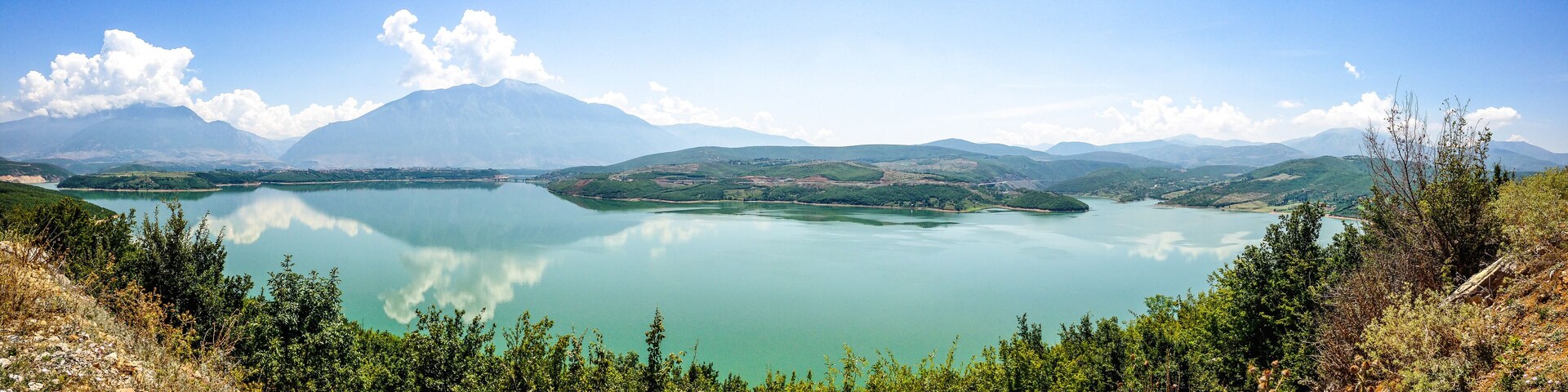 Lake Fierza near city Kukes in Albania in summer with mountains in background