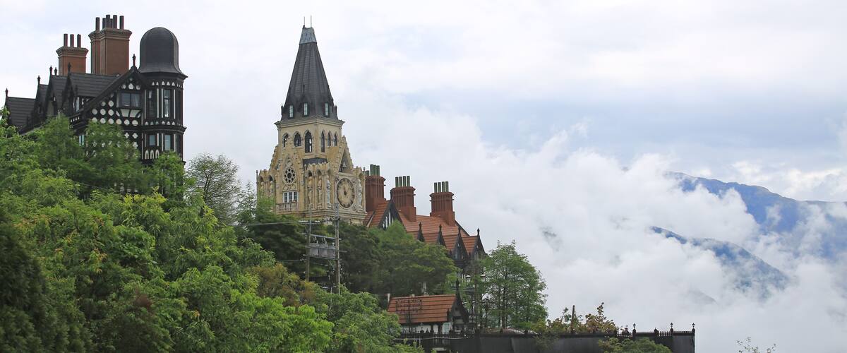 castle on the foggy peak with mountains in Cingjing Farm, Nantou, Taiwan