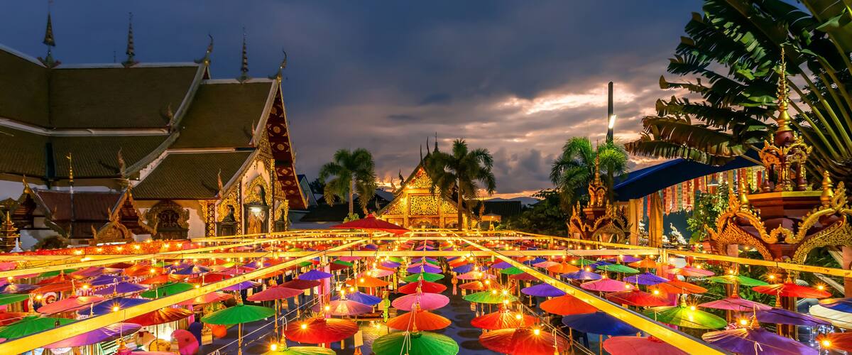 Colorful umbrella and paper vintage lantern for in northern thai style lanterns in Loi Krathong or Yi Peng Festival at Wat Phra Pan (Wat Phra Non Mae Pu Ka) is Buddhist temple in Chiang Mai,Thailand.