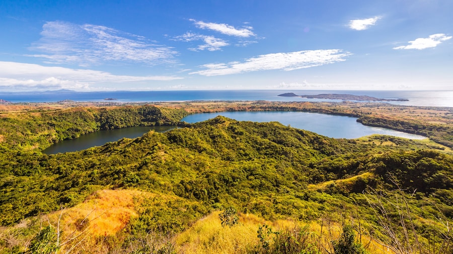 View from Mont Passot above the crater lake Lac Amparihibe and the Indian Ocean, Nosy Be, Madagascar