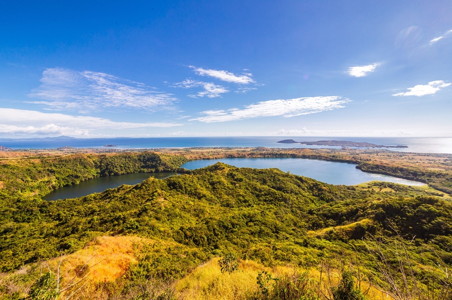 View from Mont Passot above the crater lake Lac Amparihibe and the Indian Ocean, Nosy Be, Madagascar