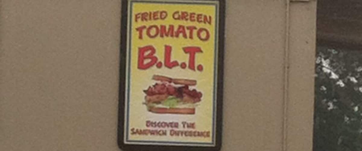 A sign advertising Fried Green Tomato B.L.T.