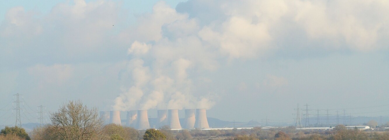 66007 heading west light engine along the freight only line through Weston-on-Trent, Derbyshire. Ratcliffe-on-Soar power station forms the background.