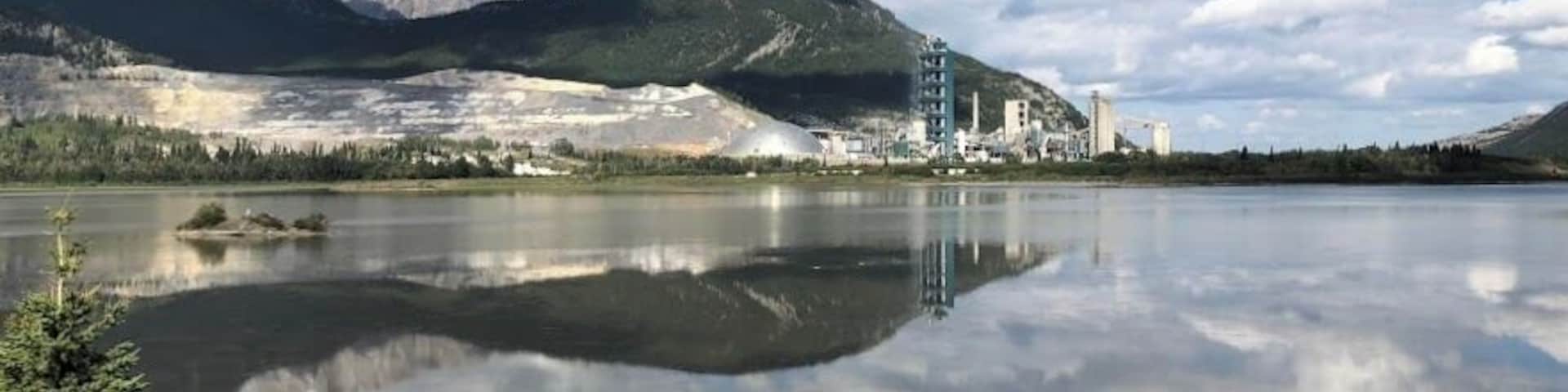This is one of the busiest attractions in Canada’s Rocky Mountains, which is a highway pullover with a view of the country’s largest cement plant on the banks of Lac des Arcs. Just behind that, a strip mine wearing down Grotto Mountain. The EcoDome, in the middle of the photo, is 35m tall and 100m diameter, can be seen from the TransCanada Highway, houses materials used in the process of producing cement and reduces the spread of dust.
#GreatOutdoors #OnTheRoad