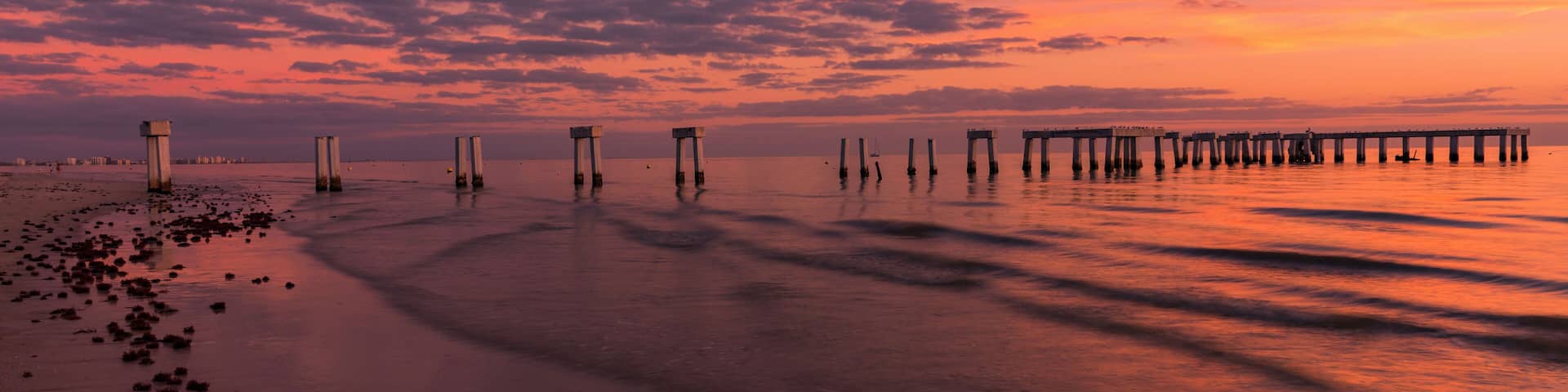 Colorful sunset.. Evening light on the fishing pier in Fort Myers Beach.