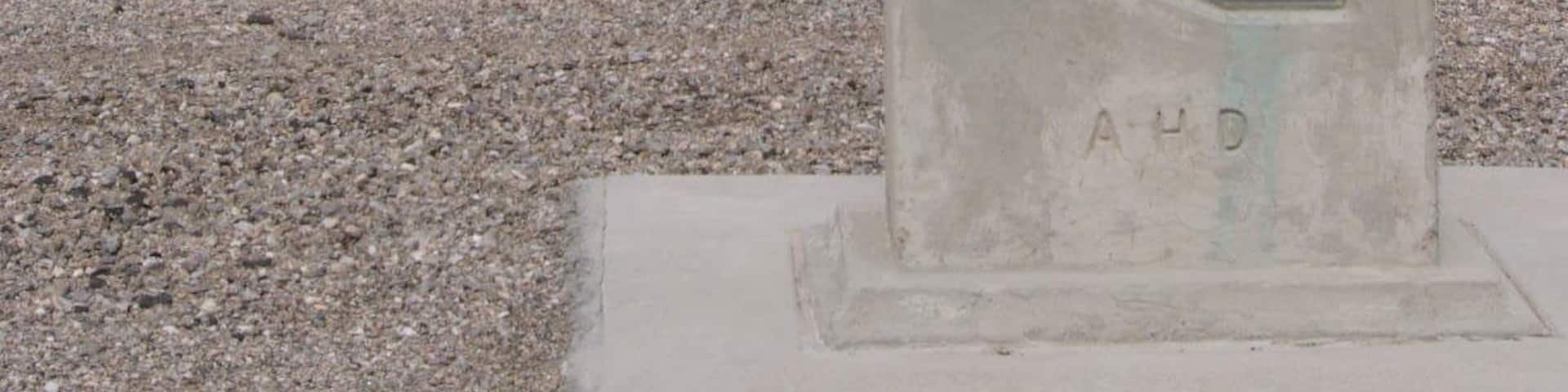 In 1892, Henry Shaffer discovered silver deposits in the area, with the help of local American Indians. The resulting mining efforts led to the creation of the town of White Hills, which reportedly grew to a population of 1,500. The mines consisted of 27 miles (43 km) of tunnels, and a full fifteen mines were being worked within one mile (1.6 km) of the town. In 1894, the White Hills Mining Company was formed to run the operations, but they sold out in 1895 for a price of $1,500,000. The new owners, part of an English company, constructed a 40-stamp mill in the town. However, water had to be piped in from 7 miles (11 km) away, and the supply was never able to meet the mine and mill's demands. Production peaked in 1898, and soon after the mill began operating only half of the time. The town went into decline, and eventually became a ghost tow