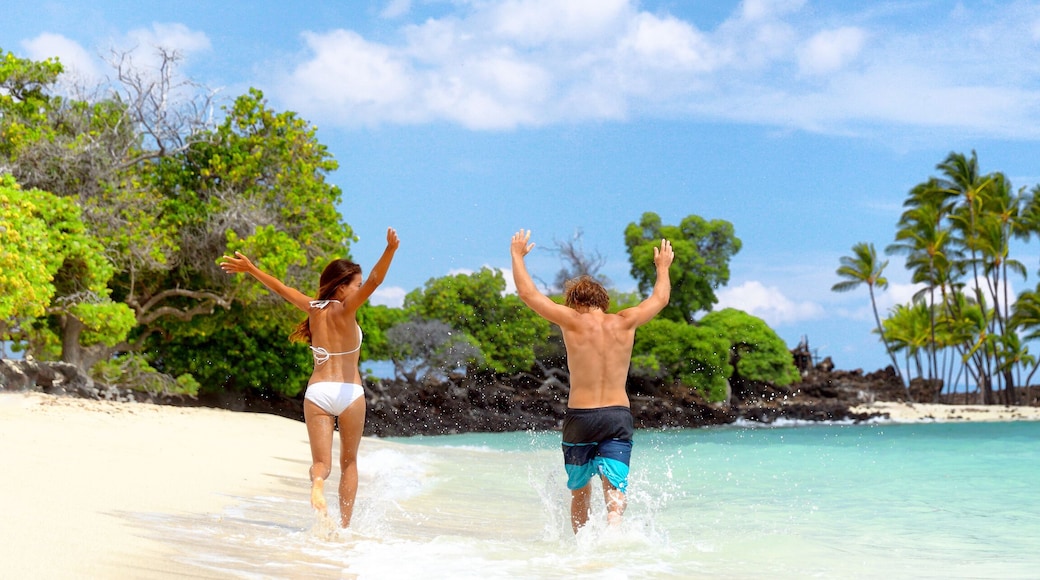 Summer fun beach couple running of joy banner with arms up in success on travel holidays. Happy people on tropical landscape background panoramic copy space.