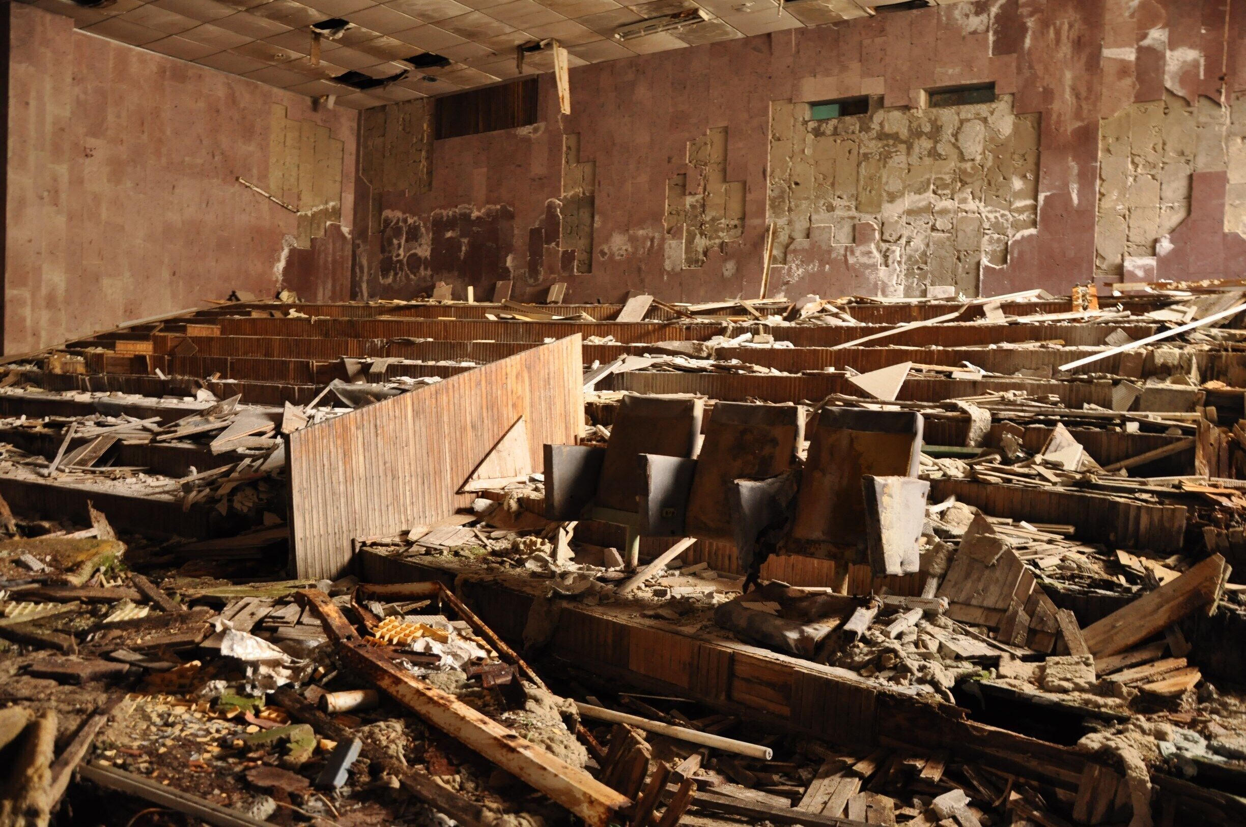 Pripyat, the ghost city that was abandoned because of the catastrophe at Chernobyl Nuclear Power Plant, looks like a tornado hit it because of vandals, NOT because there was a stampede of people trying to get away from some deadly mushroom cloud of radiation.  It's still eerie to explore and it definitely a photographer paradise, but I feel that some of the photos present a misleading history of the city.  More here: http://www.thecuriouszephyr.com/2015/04/pripyat-visiting-chernobyls-ghost-city.html